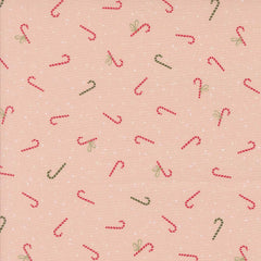 Pattern of red and green candy canes on a pink background