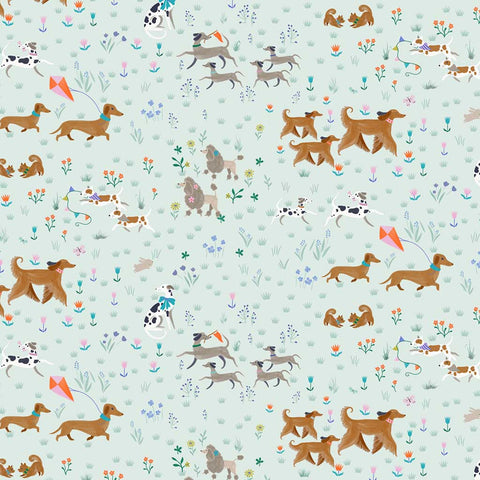 Pattern of various dog breeds on a light green background
