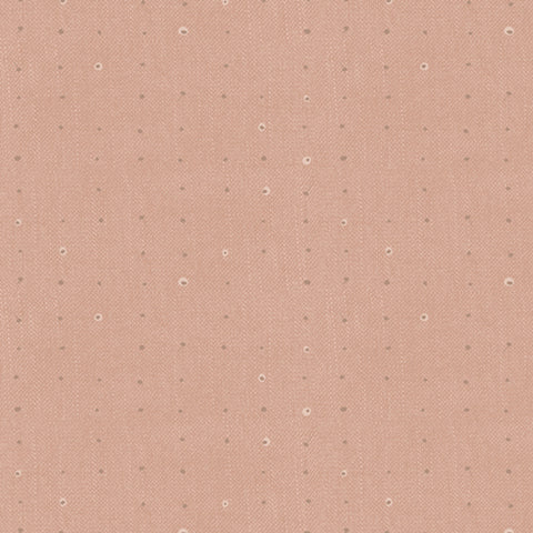 Pattern of small dots arranged in a grid on a brown background