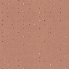 Pattern of small dots arranged in a grid on a brown background