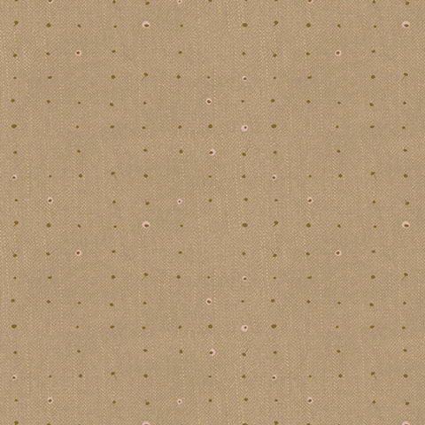 Pattern of small dots arranged in a grid on a beige background