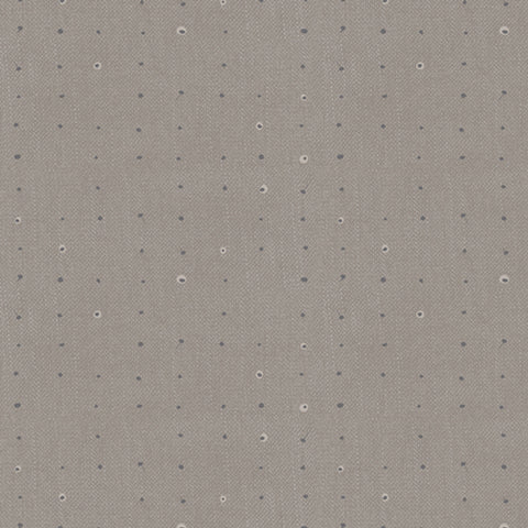 Pattern of small dots arranged in a grid on a light gray background