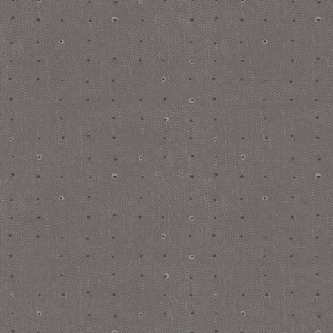Pattern of small dots arranged in a grid on a gray background
