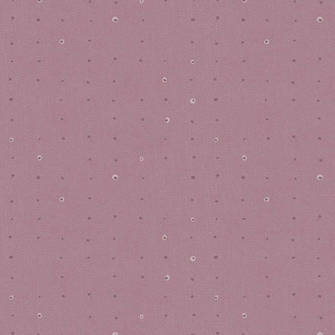 Pattern of small dots arranged in a grid on a purple background