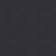 Pattern of small dots arranged in a grid on a dark gray background