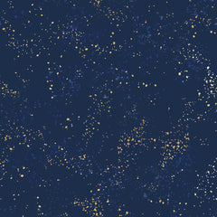 Pattern of multi-colored speckles on a navy background