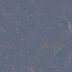 Pattern of multi-colored speckles on a dark blue background