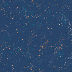 Pattern of multi-colored speckles on a blue background