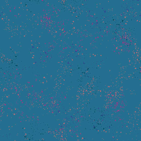 Pattern of multi-colored speckles on a blue background