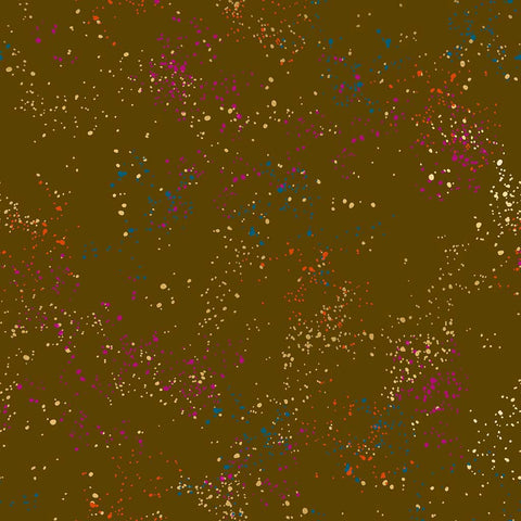 Pattern of multi-colored speckles on a brown background