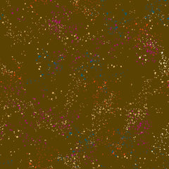 Pattern of multi-colored speckles on a brown background
