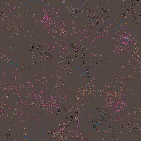 Pattern of multi-colored speckles on a dark gray background