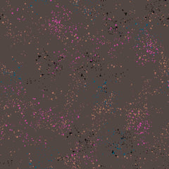 Pattern of multi-colored speckles on a dark gray background