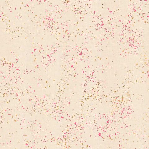 Pattern of multi-colored speckles on a light pink background