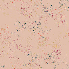 Pattern of multi-colored speckles on a light pink background