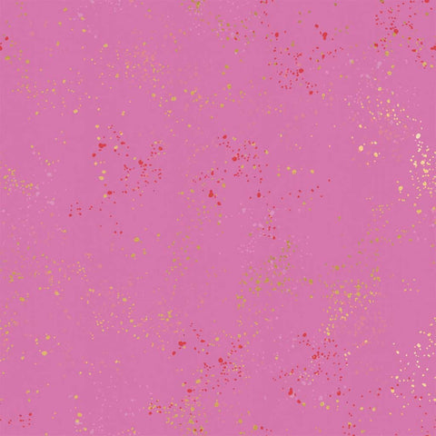 Pattern of multi-colored speckles on a light purple background