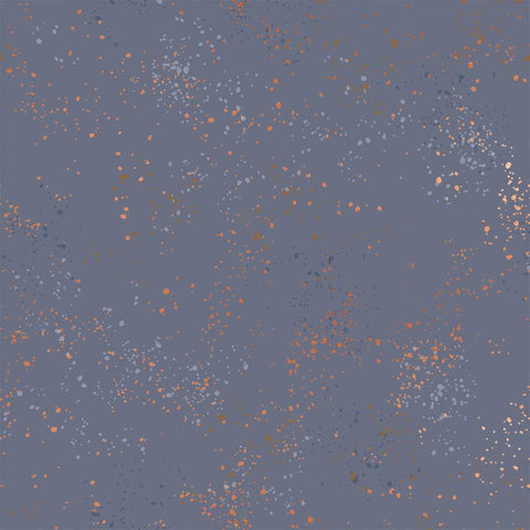 Pattern of multi-colored speckles on a dark blue background