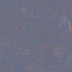 Pattern of multi-colored speckles on a dark blue background