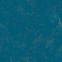 Pattern of multi-colored speckles on a teal background