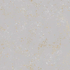 Pattern of multi-colored speckles on a light gray background