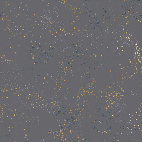 Pattern of multi-colored speckles on a dark gray background