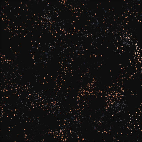Pattern of multi-colored speckles on a black background