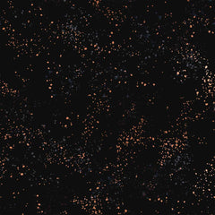 Pattern of multi-colored speckles on a black background
