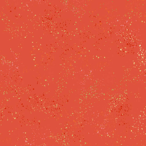Pattern of multi-colored speckles on a red background