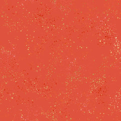 Pattern of multi-colored speckles on a red background
