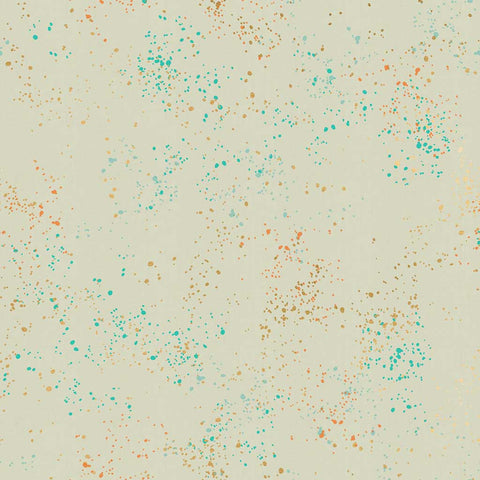 Pattern of multi-colored speckles on a beige background