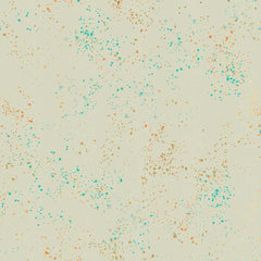 Pattern of multi-colored speckles on a beige background