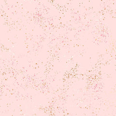 Pattern of multi-colored speckles on a light pink background