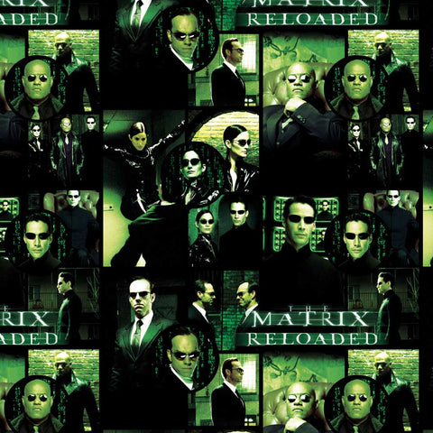 Pattern of "The Matrix Reloaded" characters in green light and text on a black background