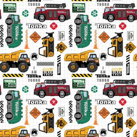Pattern of Tonka trucks and construction vehicles on a white grid background