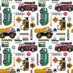 Pattern of Tonka trucks and construction vehicles on a white grid background